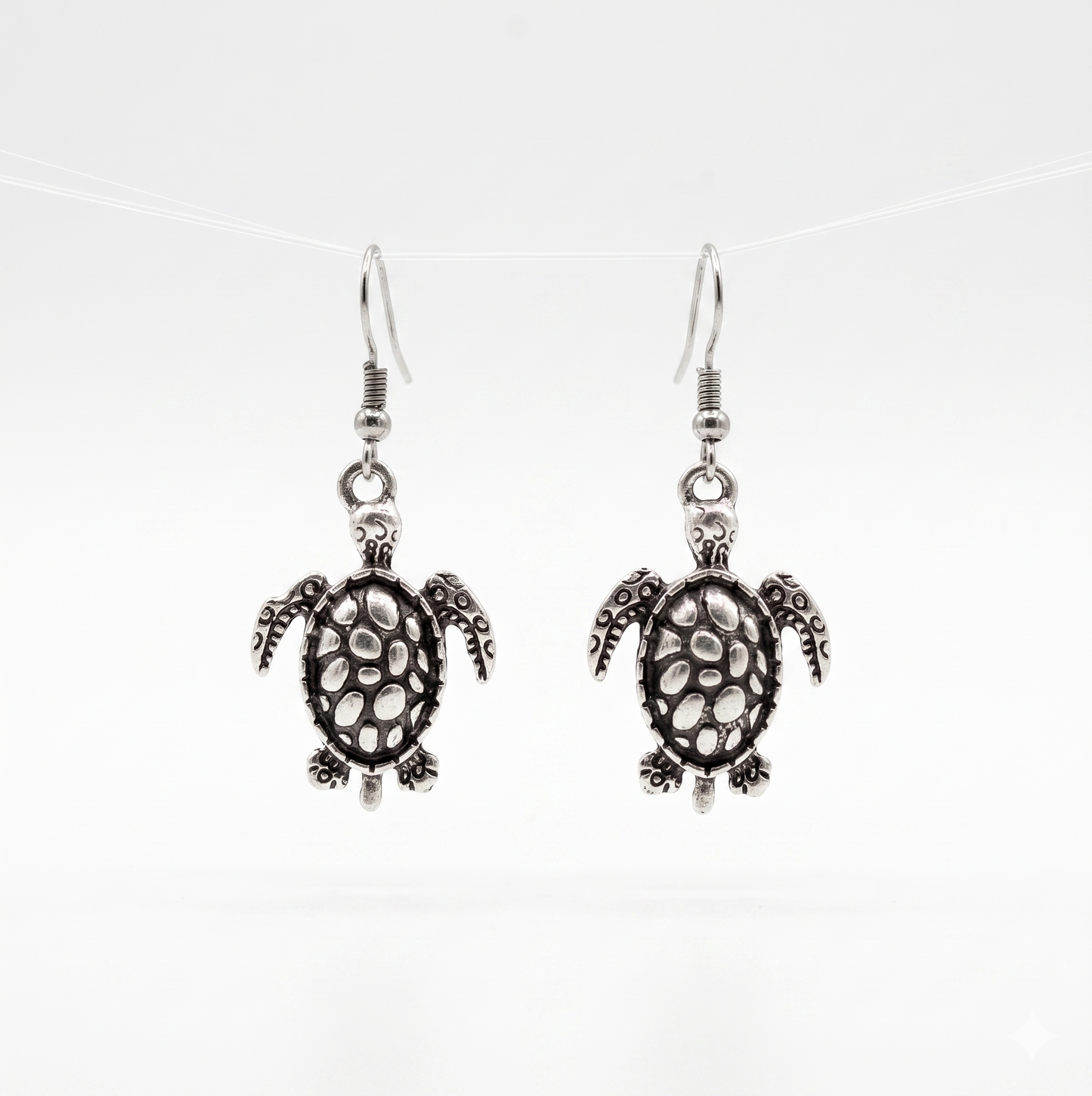 Caretta Küpe Pirinç Gümüş